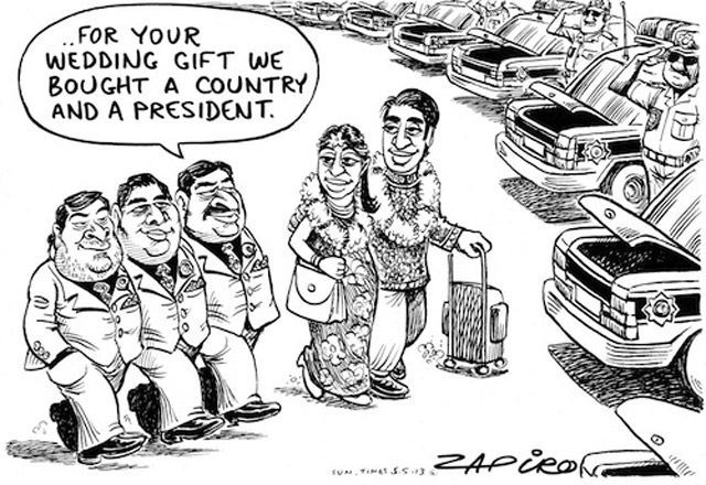Caricature de Zapiro publiée dans le  Sunday Times  du 5 mai 2013 - Traduction : pour votre cadeau de mariage, nous vous avons acheté un pays et un président !
